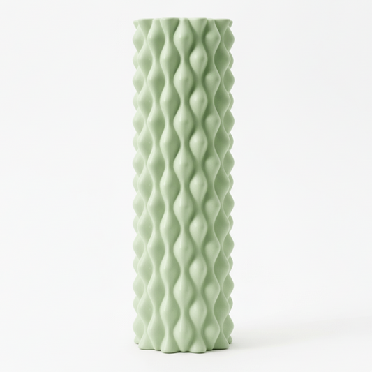 Sage Green Foam Yoga Roller With Wave like bubble pattern.